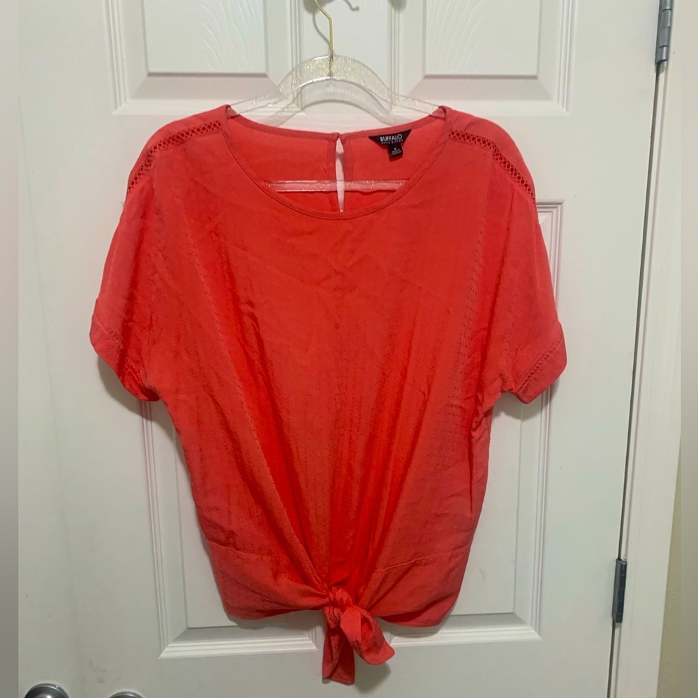 Women’s orange blouse